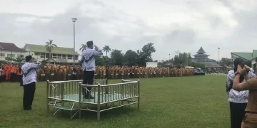 Pemkab Batang Hari Gelar Upacara Hari Guru dan HUT PGRI di Lapangan Garuda
