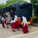 Berikan Pelayanan Transportasi Pendidikan, Satbrimob Polda Jambi Sediakan Bus Sekolah Gratis