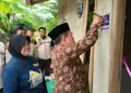 Gubernur Al Haris Serahkan Bantuan Bedah Rumah di Merangin Senilai Rp 1,72 Miliar