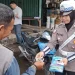 Tingkatan Kendaraan Tertib Berlalu Lintas, Satgas Preemtif Ops Zebra 2025 Sasar Komunitas Ojek di Pasar Angso Duo