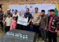 Kapolres Bersama Bupati Muaro Jambi Serahkan Bantuan Program Bedah Rumah Baznas 2025 di Desa Sakean