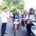 Ditreskrimsus dan Bidhumas Polda Jambi Kompak Gelar Aksi Sosial Pembagian Takjil