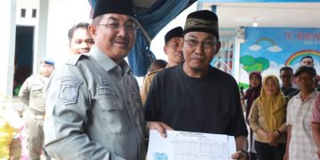 Bupati Anwar Sadat Salurkan Bantuan untuk Korban Kebakaran Teluk Nilau