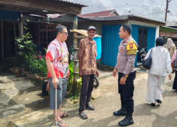 Personel Polsek Pengabuan Sambangi Warga Pasar Teluk Nilau, Imbau Pencegahan Kebakaran Permukiman