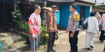 Personel Polsek Pengabuan Sambangi Warga Pasar Teluk Nilau, Imbau Pencegahan Kebakaran Permukiman