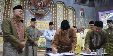 Bupati Tanjab Barat Hadiri Rapat Paripurna Hari Jadi ke-80 Kota Jambi, Teken MOU Kerjasama Antardaerah