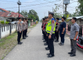 Personel Gabungan Polres Tanjab Barat dan Polsek Tungkal Ilir Amankan Pemilihan Kades PAW Desa Teluk Sialang Tahun 2026