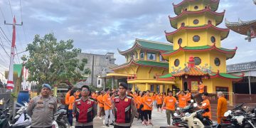 Pastikan Aman dan Lancar, Polsek Tungkal Ilir Amankan Jalan Santai Hari Raya Waisak di Vihara Budhayana Kuala Tungkal