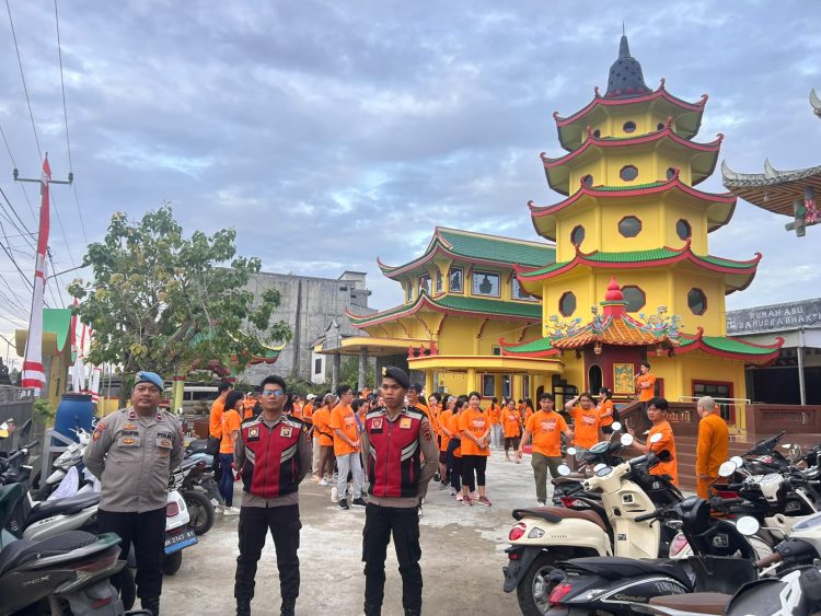 Pastikan Aman dan Lancar, Polsek Tungkal Ilir Amankan Jalan Santai Hari Raya Waisak di Vihara Budhayana Kuala Tungkal