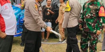 Polres Muaro Jambi Bersama One Law Firm Salurkan Bantuan Air Bersih untuk Warga Jaluko
