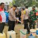 Polres Muaro Jambi Bersama One Law Firm Salurkan Bantuan Air Bersih untuk Warga Jaluko
